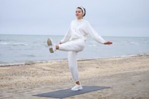 sweet-girl-standing-mat-doing-her-exercises-beach-high-quality-photo_114579-92083-300x200 Yoga for Balancing Hormones