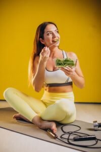 woman-eating-salad-isolated-yellow-background_1303-27060-200x300 Yoga Diet for Weight Loss A Friendly Guide